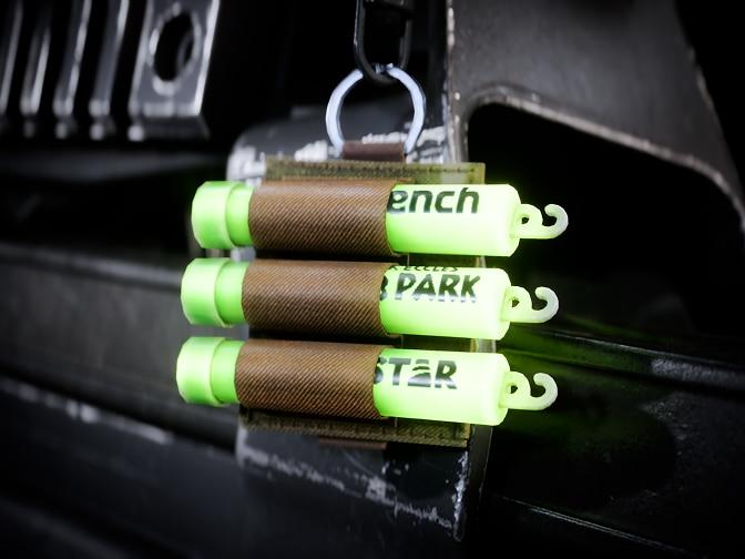 A bundle of 3 green glowsticks.