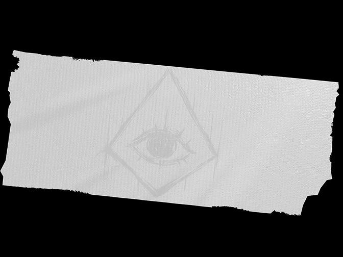 A white sticker with a faint drawing of a kite with an eye inside.