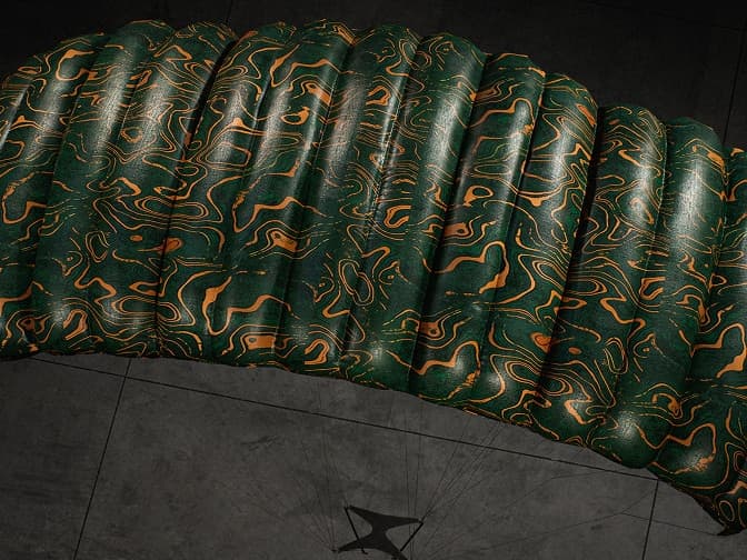 Green parachute canopy with orange contour-line pattern.