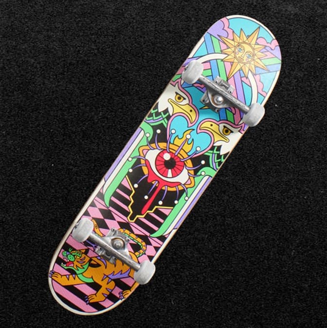 Skateboard with colorful psychedelic graphic featuring eye, sun, and tiger artwork.